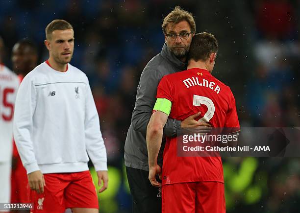 Jurgen Klopp manager of Liverpool hugs James Milner of Liverpool after the UEFA Europa League Final match between Liverpool and Sevilla at St....
