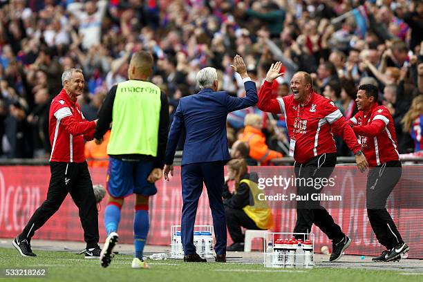 Alan Pardew manager of Crystal Palace and Andy Woodman goalkeeping coach of Crystal Palace celebrate as Jason Puncheon of Crystal Palace scores their...