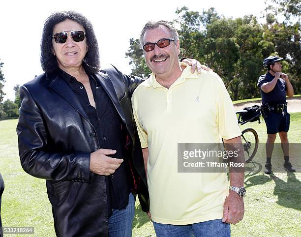 Musician Gene Simmons and LAPD Chief Charlie Beck attend the 44th Annual Los Angeles Police Memorial Foundation Celebrity Golf Tournament at Ron...