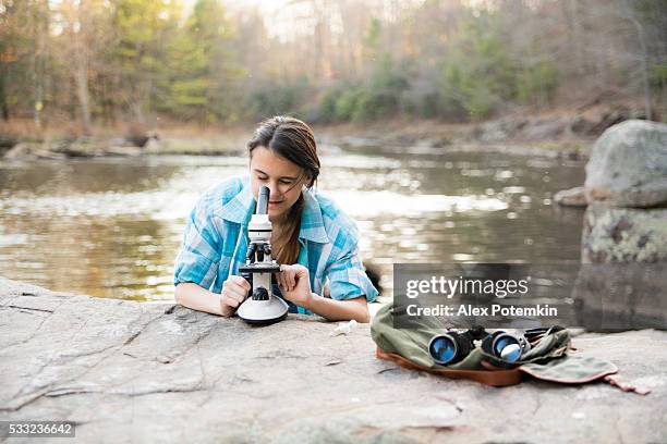 teenager girl explore nature in poconos, pennsylvania - experimental rock stock pictures, royalty-free photos & images