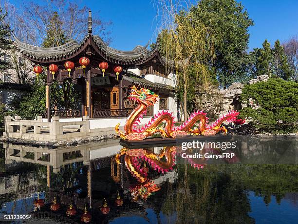 chinese dragon sculpture lantern lan su chinese garden portland oregon - oriental garden stock pictures, royalty-free photos & images