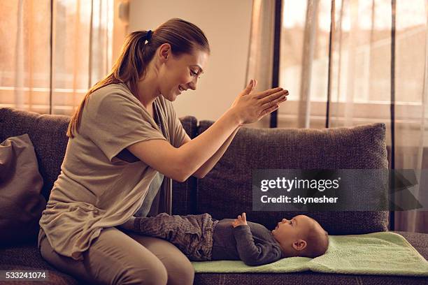 Clapping Mother Mom Clapping With Baby Photos and Premium High Res Pictures - Getty Images