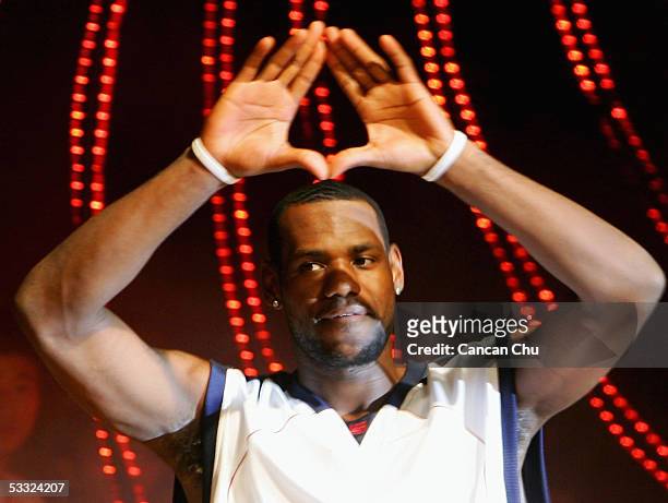 LeBron James of the Cleveland Cavaliers waves to his fans during the Nike 2005 Battlegrounds event August 4, 2005 in Beijing, China. James is on a...