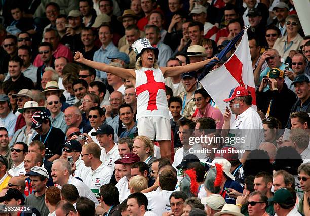 Member of the Barmy Army sings full voice during day one of the Second npower Ashes Test match between England and Australia at Edgbaston on August...