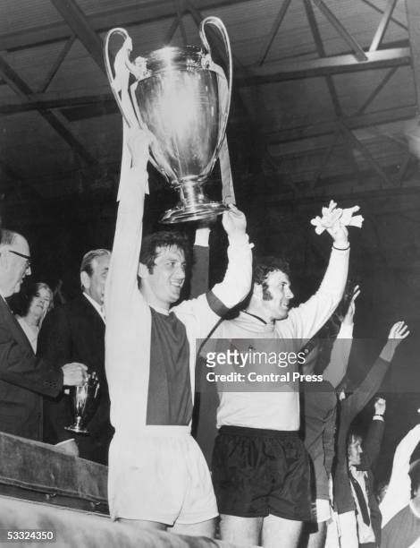 Ajax captain Velibor Vasovic lifts the European Cup at Wembley Stadium, London, after his team won the final against Panathinaikos 2-0, 2nd June...