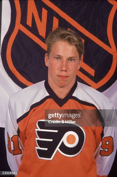 Portrait of Swediah hockey player Peter Forsberg wearing a Philadelphia Flyers jersey at the NHL Entry Draft, 1991.