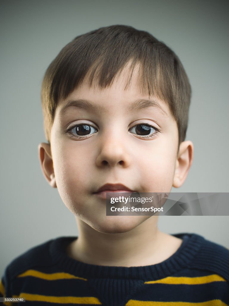 Portrait of a 4 years old boy with happy expression