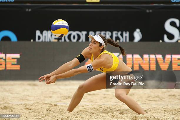 Elsa Baquerizo of Spain digs for the ball during Bronze Medal match against Sophie van Gestel and Jantine van der Vlist of the Netherlands during day...