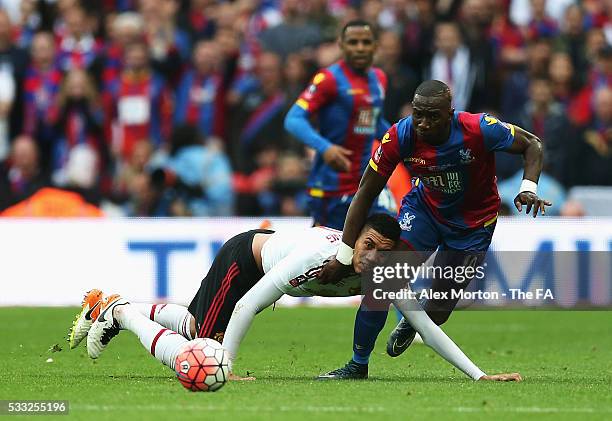 Chris Smalling of Manchester United fouls Yannick Bolasie of Crystal Palace resulting in the second yellow card and sent off during The Emirates FA...