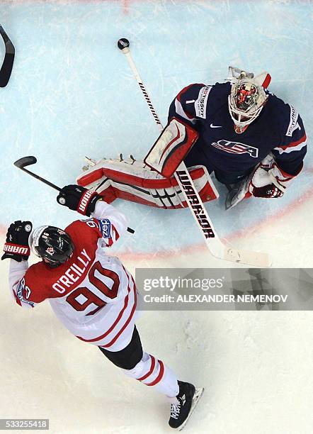 Canada's forward Ryan O'Reilly celebrates in front of US goalie Keith Kinkaid during the semifinal game Canada vs USA at the 2016 IIHF Ice Hockey...