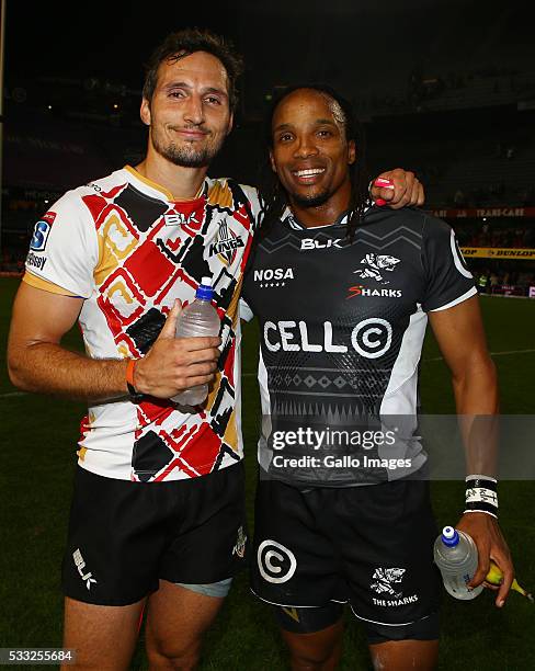 Jurgen Visser of the Southern Kings with Odwa Ndungane of the Cell C Sharks during the round 13 Super Rugby match between Cell C Sharks and Southern...