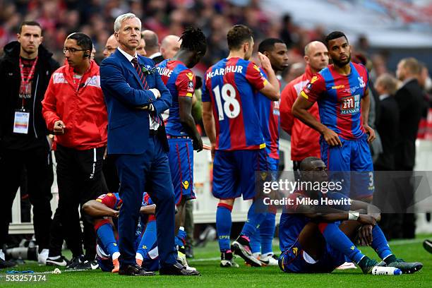 Alan Pardew manager of Crystal Palace looks dejected in defeat after The Emirates FA Cup Final match between Manchester United and Crystal Palace at...