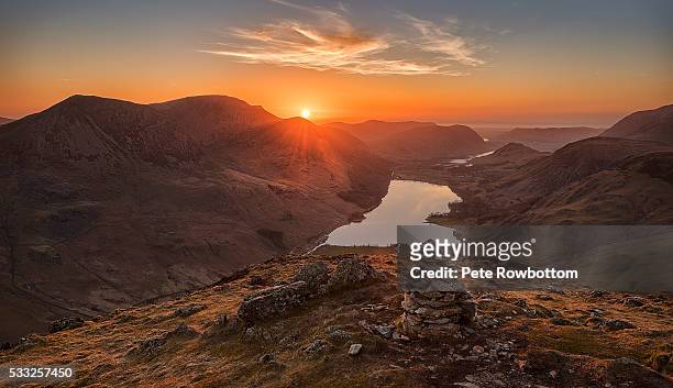 fleetwith pike sunset - haystacks lake district stock pictures, royalty-free photos & images