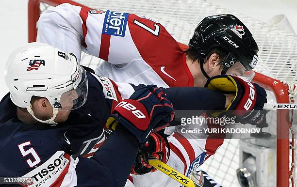 Defender Connor Murphy clashes with Canada's forward Connor McDavid during the semifinal game Canada vs USA at the 2016 IIHF Ice Hockey World...