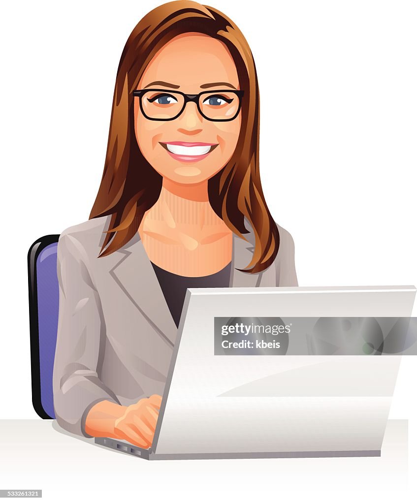 Mujer joven con gafas usando una computadora portátil en la habitación