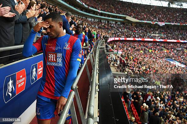 Jason Puncheon of Crystal Palace shows his dejection as he receives the runners-up medal during The Emirates FA Cup Final match between Manchester...