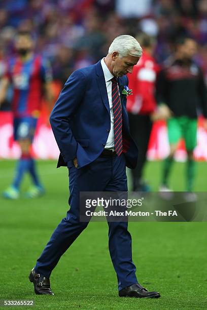 Alan Pardew Manager of Crystal Palace looks dejected after The Emirates FA Cup Final match between Manchester United and Crystal Palace at Wembley...