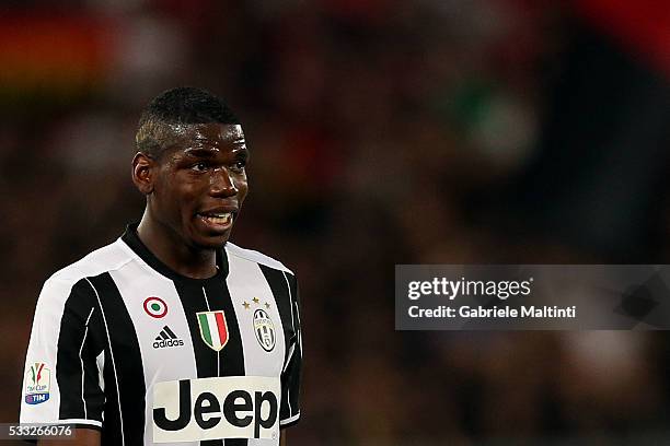 Paul Pogba of Juventus FC looks on during the TIM Cup match between AC Milan and Juventus FC at Stadio Olimpico on May 21, 2016 in Rome, Italy.