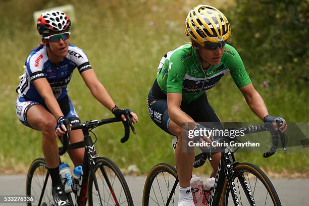 Emma Johansson of Sweden riding for Wiggle High5 Pro Cycling in the green points jersey rides with Kristin Armstrong of the United States riding for...