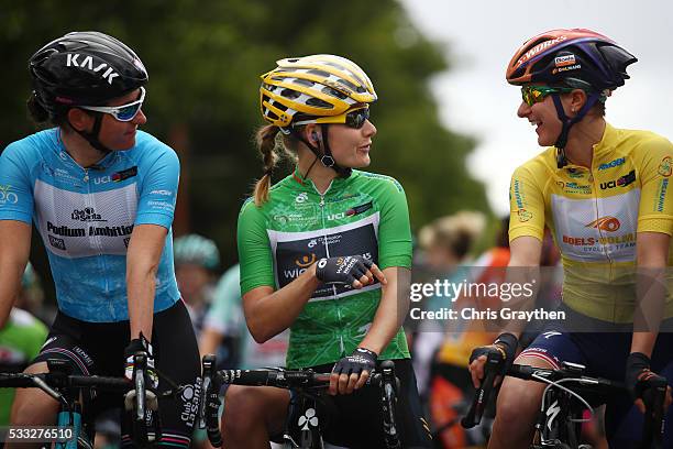 From left, Sarah Storey of Great Britian riding for Podium Ambition Pro Cycling in the most courageous rider jersey talks with Emma Johansson of...