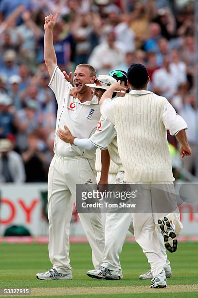 Andrew Flintoff of England celebrates the wicket of Michael Kasprowicz of Australia with team mates during day two of the Second npower Ashes Test...