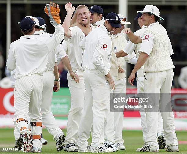 Andrew Flintoff of England celebrates the wicket of Michael Kasprowicz of Australia with team mates during day two of the Second npower Ashes Test...