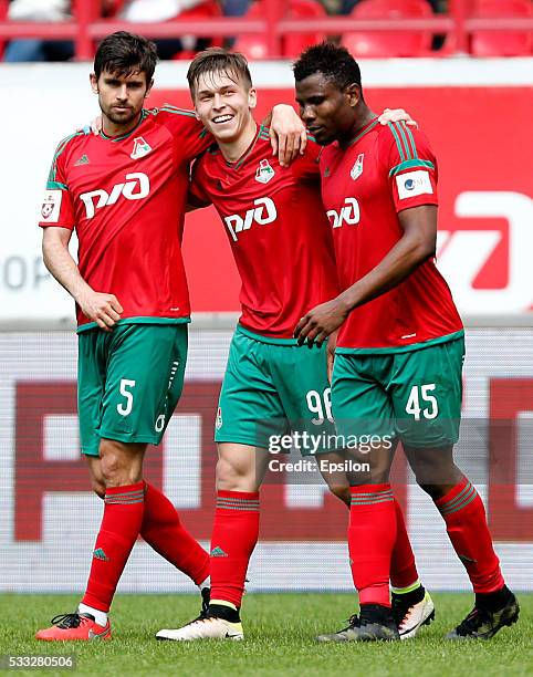 Nemanja Pejcinovic, Rifat Zhemaletdinov and Ezekiel Henty of FC Lokomotiv Moscow celebrate after scoring a goal during the Russian Premier League...