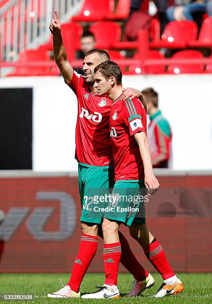 Petar Skuletic and Aleksandr Kolomeytsev of FC Lokomotiv Moscow celebrate after scoring a goal during the Russian Premier League match between FC...