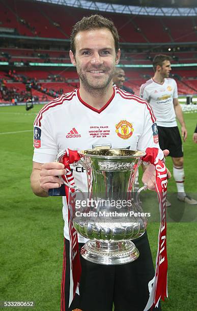 Juan Mata of Manchester United celebrates with the FA Cup trophy after The Emirates FA Cup final match between Manchester United and Crystal Palace...