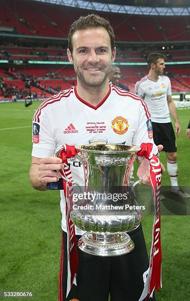 Juan Mata of Manchester United celebrates with the FA Cup trophy after The Emirates FA Cup final match between Manchester United and Crystal Palace...