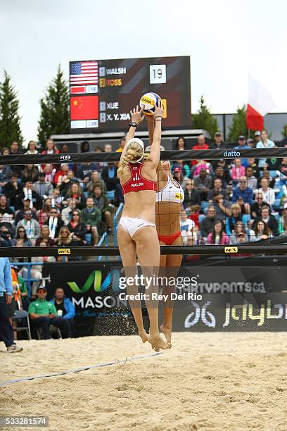 Xinyi Xia of China joust against Kerri Walsh Jennings of the USA during the Gold medal match against during day 5 of the 2016 AVP Cincinnati Open on...