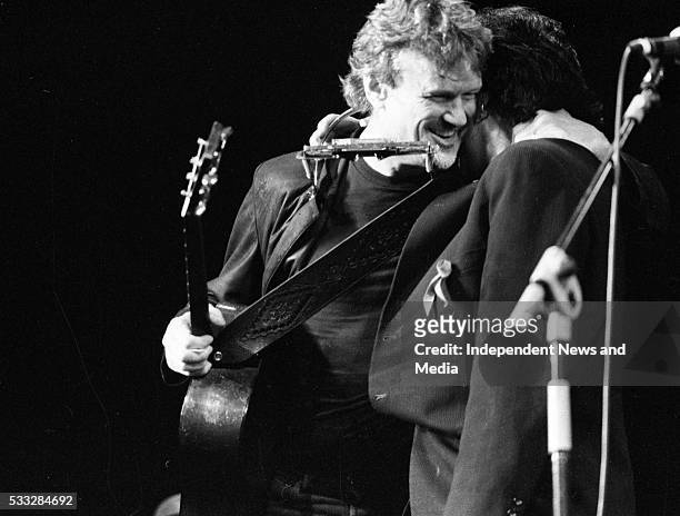 Kris Kristofferson performing with U2's Bono at the Olympia Theatre Dublin, . .