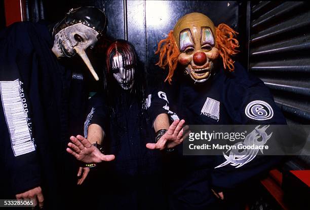Slipknot, backstage at Brixton Academy, London, United Kingdom, 5th March 2000. L-R Chris Fehn, Joey Jordison, Shawn Crahan.