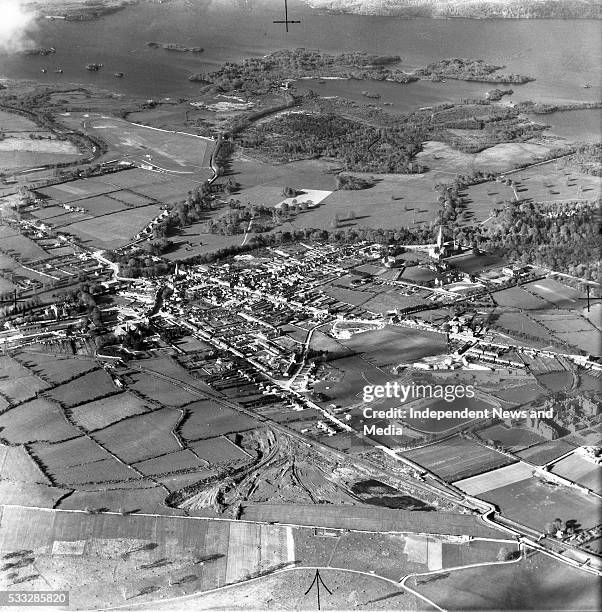 Killarney from the air, showing in the background a section of the famous Lower Lake, with Ross Castle in the centre position The Killarney Cathedral...