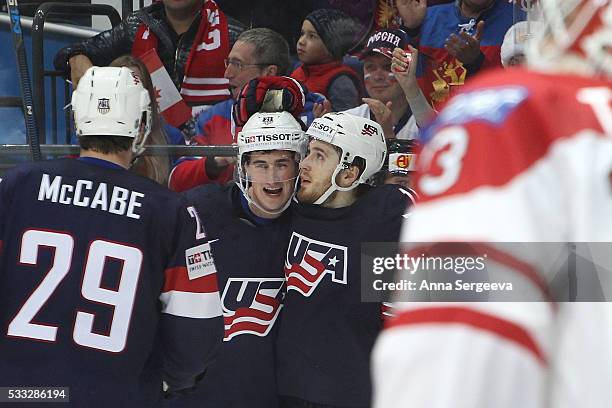 Dylan Larkin of USA, Tyler Motte and Jake McCabe of USA celebrate second period goal of Auston Matthews against Canada at Ice Palace on May 21, 2016...