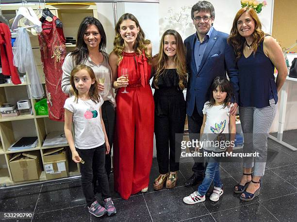 President of Catalunya Carles Puigdemont and Mireia Vidal attend the inauguration of the new store of Mireia Vidal Bridal on May 21, 2016 in...