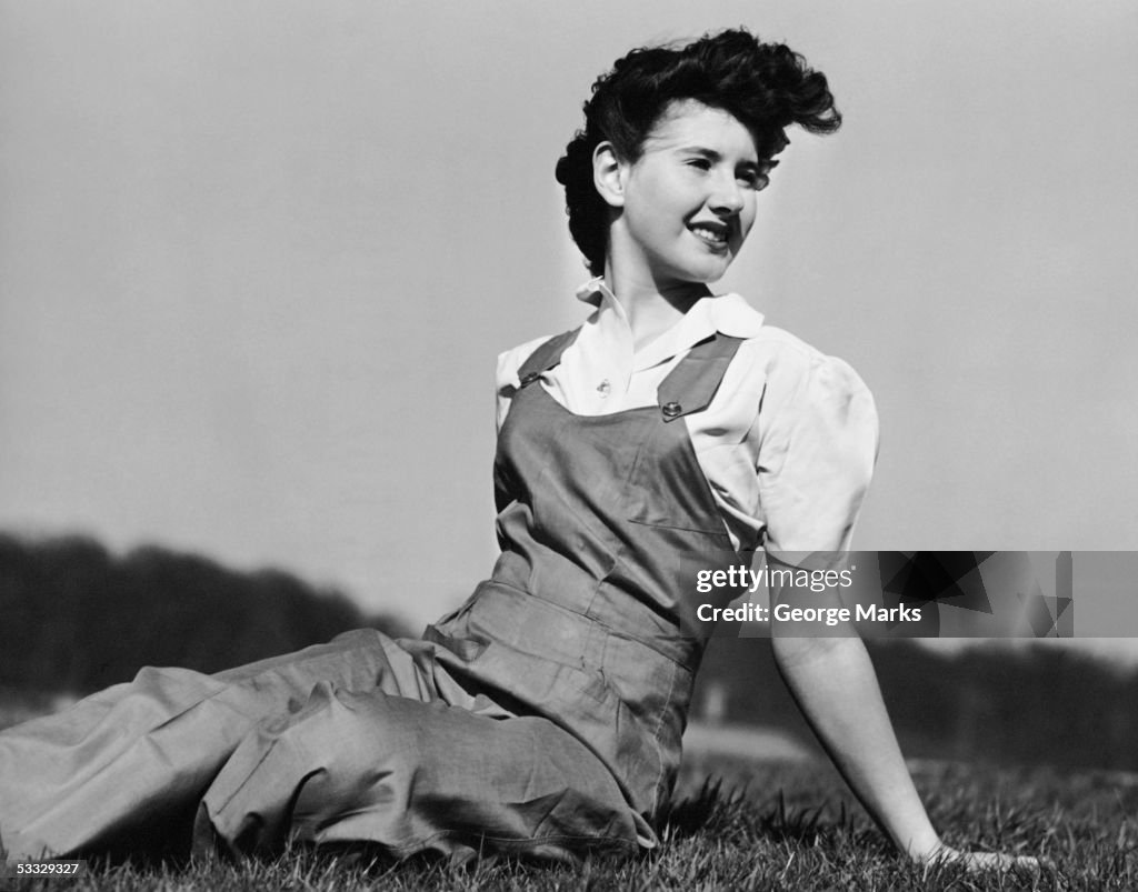 Portait of woman posing on grass