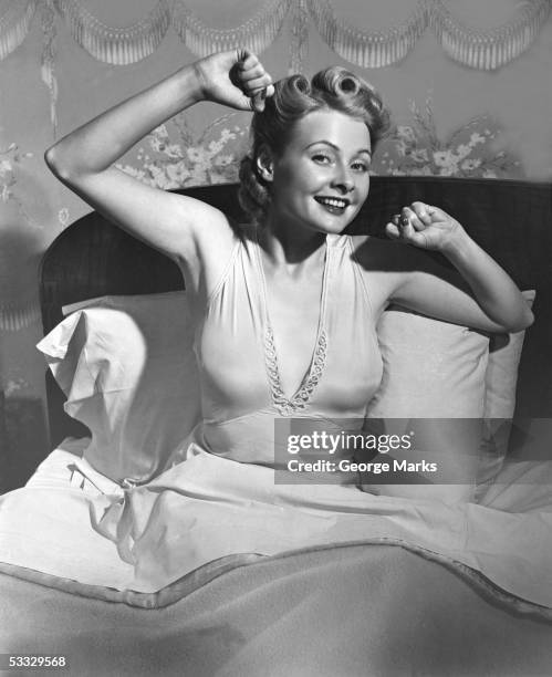 woman in bed - 1950s bedroom stock pictures, royalty-free photos & images