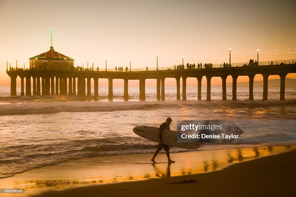 Manhattan beach surfer silhouette