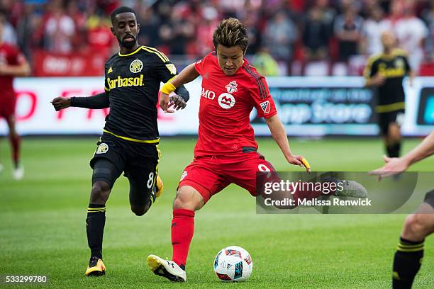 Toronto FC forward Tsubasa Endoh passes the ball during the second half action of MLS season play between Toronto FC and Columbus Crew SC at the BMO...