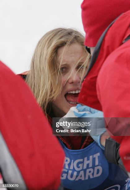 Anne-Flore Marxer of Switzerland loses a bit of blood after a hard landing during warm-ups at the finish of the women's Snowboard Slopestyle...