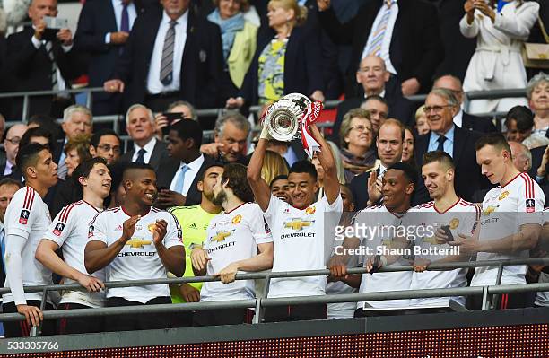 Winning goalscorer Jesse Lingard of Manchester United celebrates with the trophy after winning The Emirates FA Cup Final match between Manchester...