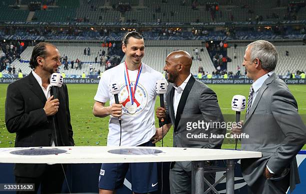 Zlatan Ibrahimovic of PSG is interviewed by Lionel Charbonnier , Olivier Dacourt and Alain Roche for Eurosport following the French Cup Final match...