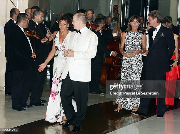 Prince Albert II of Monaco accompanied by Princess Stephanie of Monaco , Princess Caroline of Hanover and Prince Ernst August of Hanover arrive at...