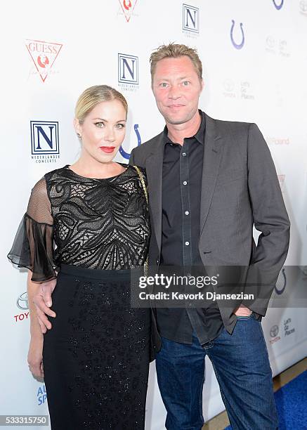 Actress Christina Applegate and musician Martyn LeNoble attend the 4th Annual Light Up The Blues at the Pantages Theatre on May 21, 2016 in...