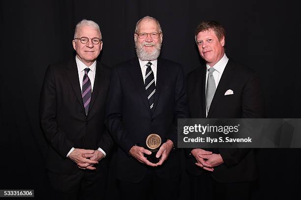 Steve Martin, David Letterman, and Jeffrey P. Jones pose backstage during The 75th Annual Peabody Awards Ceremony at Cipriani Wall Street on May 21,...