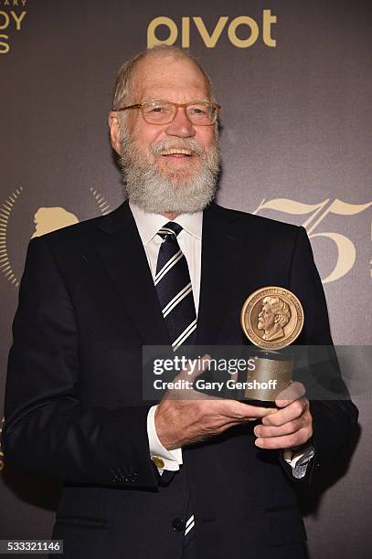 David Letterman poses with award during The 75th Annual Peabody Awards Ceremony at Cipriani Wall Street on May 21, 2016 in New York City.
