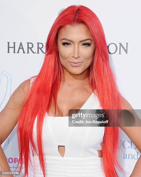 Wrestler Eva Marie arrives at the Kaleidoscope Ball at 3LABS on May 21, 2016 in Culver City, California.