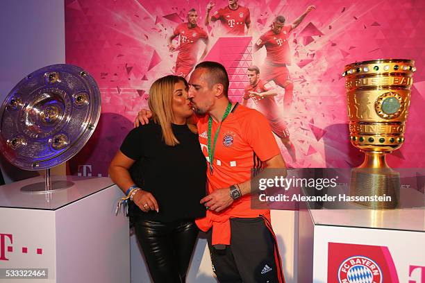 Franck Ribery of Bayern Muenchen attends with his wife Wahiba Ribery the FC Bayern Muenchen champions party at Deutsche Telekom's representative...