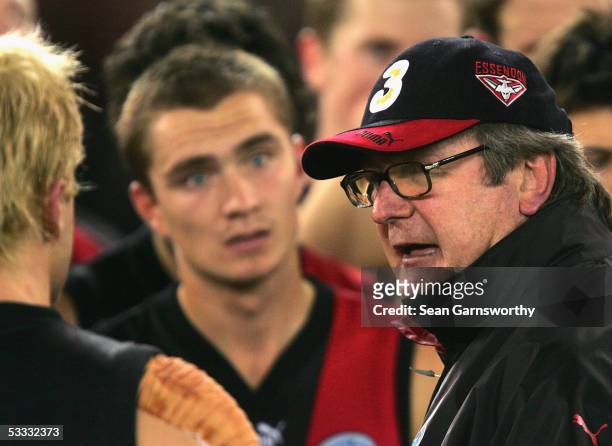 Essendon coach Kevin Sheedy addresses his players during the AFL Round 19 match between the Essendon Bombers and Sydney Swans at the Telstra Dome...